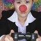 Illustration for article titled Fake Gamer of the Week: If She's Going to Play With You Clowns She Might as Well Look the Part